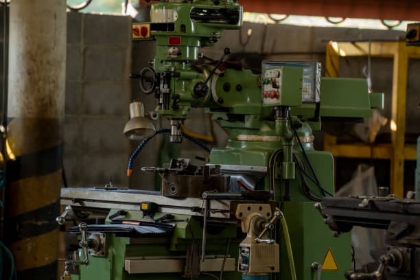 The old lathe machine in a industrial factory,Small workshop for metal processing,lathes,Industry,Maintenance.